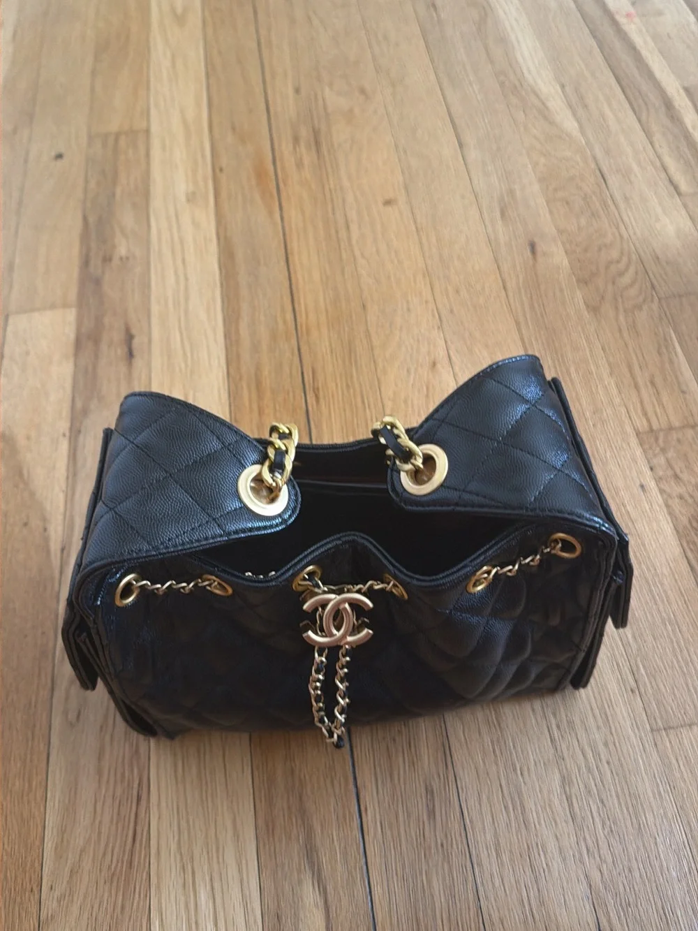 CHANEL 25 Black Quilted Shoulder Drawstring Bag with Gold Hardware